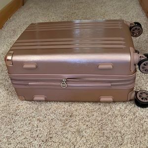 Pink Calpak suitcase